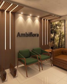 an office lobby with two green chairs and a brown couch in front of a wall that reads ambiflora