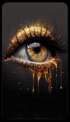 an eye with gold glitter on it and dripping water coming out of the iris's eyes