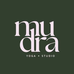 the logo for mudraa yoga studio, which is located in front of a dark green background