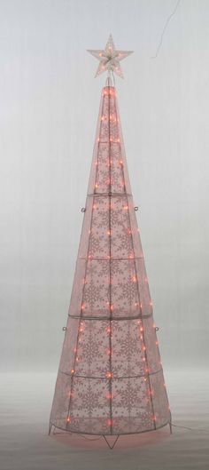 Light up your Hoilday with this 72" Color changing LED Glittering Snowflake Cone tree sculpture. INDOOR/OUTDOOR USE, This sculpture is made with K/D constuction, and coated metal with glittering snowflake.60" Lead wire, with 115 PCS color change LED bulbs. Metal Stakes included. EverStar 72-in Tree Yard Decoration with Clear LED Lights | ES-67004 Cone Trees, Tree Sculpture, Color Changing Led, Tree Ideas, Outdoor Christmas Decorations, Outdoor Christmas, Yard Decor, Color Change, Led Bulb