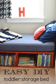 a bedroom with a bed, bookshelf and window