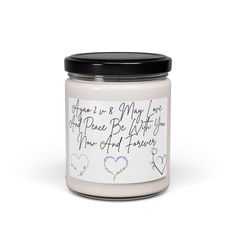 a white jar with writing on it and hearts around the lid, in front of a white background