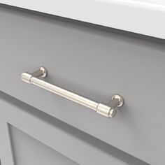 a close up of a handle on a cabinet door