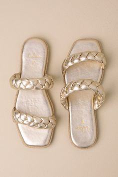 Step into summer with a fresh new look thanks to the Lulus Kennmar Soft Gold Leather Braided Espadrille Slide Sandals! These metallic genuine leather sandals have a comfortable slide-on design, two braided straps, and a square toe bed. Sole is trimmed in beachy jute for a Boho-inspired finish. 0. 5" rubber heel. Cushioned insole. Rubber sole has nonskid markings. Genuine leather upper. Balance man made materials. Imported. Lulus | Kennmar Soft Gold Leather Braided Espadrille Slide Sandal Heels | Espadrilles Slides, Genuine Leather Sandals, Sandal Heels, Gold Shoes, Gold Sandals, Braided Strap, Rubber Heels, Gold Leather, Flat Sandals