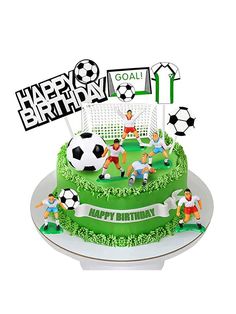 a birthday cake with soccer players on it