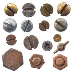 an assortment of metal buttons and screws on a white background stock photo - images