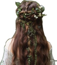 a woman with long hair and flowers in her hair