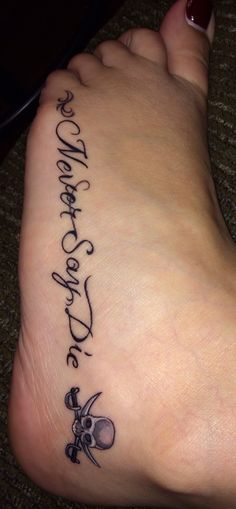 a person with a tattoo on their foot