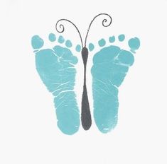 a baby's footprints are shown in the shape of a butterfly