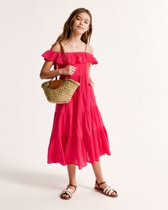 Flattering maxi dress in a soft cotton fabric, featuring off-the-shoulder detail, adjustable straps and a tiered skirt. Flattering Maxi Dress, Cologne Collection, Active Swimwear, Girls Maxi Dresses, American Clothing, Boys Romper, Girl Online, Abercrombie Kids, Dress Girls