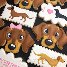 some decorated cookies with dogs on them