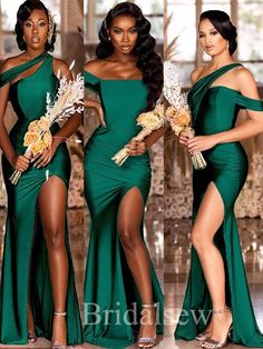 three women in green dresses posing for the camera