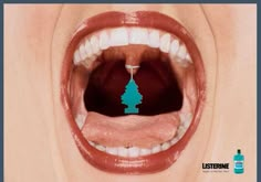 a woman's mouth with a christmas tree on it