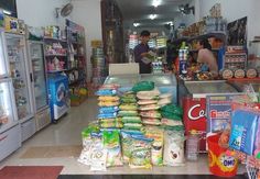 a store filled with lots of food and vending machines