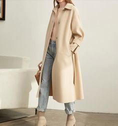 Product Description: This is a handmade cashmere coat high grade fabric,cashmere fabric.also could be custom made with any size and other colors,please feel free to contact with me if you want custom it. Material: wool 80%- 90% Size: S: Bust : 110 cm shoulder:51cm Sleeve:50cm Length:107 cm M: Bust : 114 cm shoulder:52cm Sleeve: 51 cm Length: 107 cm L: Bust : 118 cm shoulder:53cm Sleeve:52 cm Length:107 cm XL: Bust :122 cm shoulder:54cm Sleeve:53 cm Length:107 cm Belted Wool Coat, Cashmere Fabric, Long Wool Coat, Woolen Coat, Cashmere Coat, Winter Wardrobe, Wool Coat, Waist Belt, High Grade