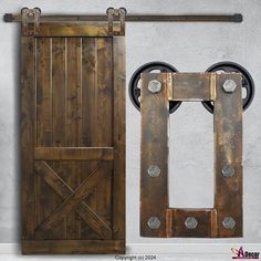 an old wooden door is opened to reveal a rustic design with metal hardware on the side