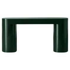 a dark green table with two legs on the top and one leg extended to the side