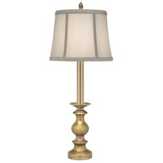 a gold lamp with a white shade on it