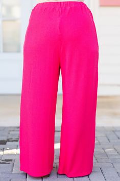 You know you need these beauties in your life! These pants in hot pink offer a flowy fit for both casual outings and comfortable lounging! The bold color adds versatility to any wardrobe! Expertly crafted and perfect for all-day wear! 67% Polyester, 25% Rayon, 8% Spandex Pink Straight Pants For Loungewear, Pink Wide Leg Loungewear Pants, Pink Wide Leg Pants With Elastic Waistband For Loungewear, Pink Wide Leg Pants For Loungewear, Pink Ankle-length Wide Leg Pants With Elastic Waistband, Pink Wide Leg Ankle-length Pants With Elastic Waistband, Chic Pink Wide Leg Loungewear Pants, Chic Pink Loungewear Pants, Casual Pink Wide Leg Pants For Loungewear