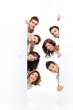 group of people peeking out from behind a white board stock photos, images and clippings