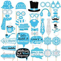 blue and white photo booth props with snowflakes, hats, mittens, mustaches