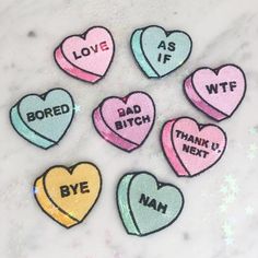 six iron - on patches with words that spell out love as if they were written in different colors