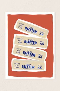 three butter stickers sitting on top of each other