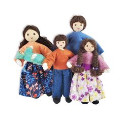 three dolls are standing next to each other