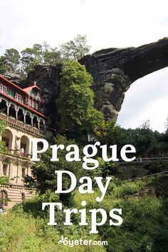 a castle with the words prague day trips over it