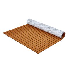 a roll of wood flooring on top of a white background with blue polka dots