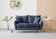 modern navy blue velvet 2 seater with winged back cushion corners on gold tapered metal legs Velvet Sofa Gold, Navy Blue Sofa, Flat Interior