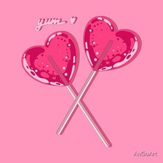 two heart shaped lollipops with the words yum on them against a pink background