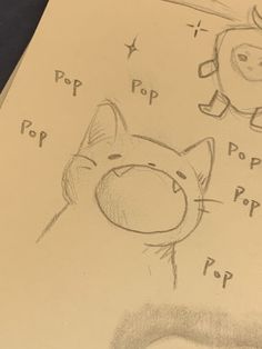 a drawing of a cat and an apple on top of a piece of paper that says pop pop pop