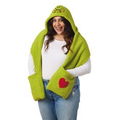 You'll be wearing a Grinchy grin whenever you enjoy winter activities in this handy hooded scarf. Cozy green scarf features a Grinch face embroidered on the hood and includes two large pockets on the ends of the scarf for warming your hands or carrying necessities. A red heart-shaped appliqué on one of the two pockets adds heartwarming charm to the soft fleece scarf. It makes a fun gift for a teacher, college kid or Grinch fan. | Green Grinch hooded scarf features embroidered and appliqué accents on the hood and one pocket. | Makes a great gift for Grinch fans. | Imported. 100% polyester. | Hand wash. Do not bleach. Hang to dry. Do not iron. Do not dry clean. | 68'' L Hooded Scarf With Pockets, Scarf With Pockets, Grinch Who Stole Christmas, Grinch Face, The Grinch Stole Christmas, Fleece Scarf, Enjoy Winter, Blue Q, College Kids