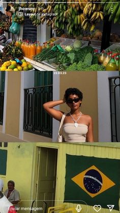 a woman standing in front of a bunch of fruits and vegetables on the side of a building