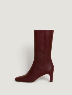 Smooth leather ankle boots.      * Burgundy color   * Heel height: 7cm   * Golden "R" logo on the back of the heel   * Comfortable elastic inside at the calf   * Inside zip over the entire height of the boot   * To ensure that your shoes last, we recommend that you have your shoemaker install a permanent front pad shortly after the first few uses   * Made in Italy Dark Red Boots, Burgundy Boots Ankle, R Logo, Burgundy Boots, Shoe Last, Classic Heels, Red Boots, Brown Heels, Crocodile Leather