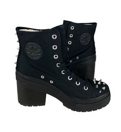 One pair of new without box unisex adult Converse Chuck 70 De Luxe Heel Hi Studded Boot (A08103C). The color is black, and the size is woemn's US 10 (fits men's US 8) (UK 8, EUR 41.5, CM 26.5). Specifications: High heel  Studded accents High top Canvas material upper Converse Chuck Taylor All Star logo on inner ankle and back heel  Shipping: We ship all items within 24 hours excluding weekends and federally recognized holidays. Returns: We accept domestic returns for this item within 30 days. New items returned in used condition will not be accepted. Questions? Feel free to message us. We will return your message promptly. Looking for more discounted brand names? Shop our store! Heels Converse, Chuck 70 De Luxe Heel, Rockstar Aesthetic, New Converse, Converse Chuck 70, Studded Boots, Star Logo, Chuck 70, Black Boots Women