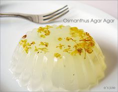 a dessert on a plate with a fork next to it