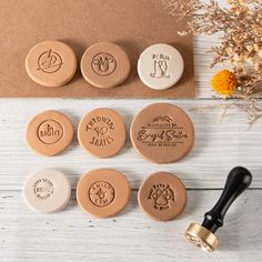 six wooden stamps with different designs on them