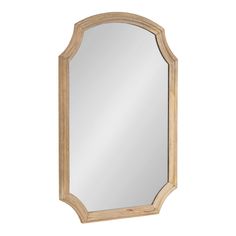 a mirror that is on the wall next to a white background and it has a wooden frame