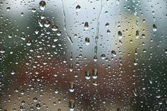 rain drops on the window with blurry background