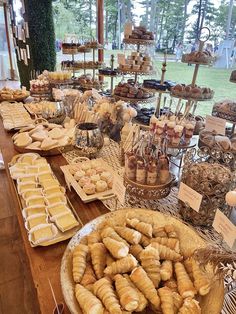 an assortment of pastries and desserts displayed on a table