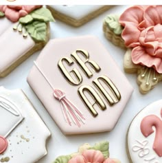 decorated cookies with the words god and flowers on them are displayed in front of a white background