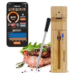 an electronic meat thermometer is shown next to a piece of food and a cell phone