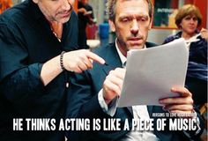 two men looking at something on a piece of paper with the caption he thinks acting is like a piece of music