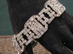 "WE SELL THIS NICE ANTIQUE BRACELET, MADE IN SILVER sterling hallmarked 935, probably french decorated with hundred clear rhinestones or paste stones, MEASURES 7 1/2 X 13/16\" , TOTAL WEIGHT 58.0gr , IN VERY GOOD CONDITION , GREAT SHAPE As is a vintage antique item , it's unique , for that if you like to wear it , don't miss the opportunity, we gladly offer MICRO-PAYMENTS upon request, email me with your payment plan. OUR POLICY: -YOU CAN BUY ALL OUR ITEMS AND MUST PAY JUST ONE SHIPPING PRICE, N Elegant Antique Silver Bracelets For Formal Occasions, Art Deco Diamond Bracelets For Weddings, Vintage Diamond Accents Bracelet For Formal Occasions, Antique Silver Elegant Wedding Bracelets, Vintage Bracelets With Diamond Accents For Formal Occasions, Elegant Antique Silver Bracelets For Wedding, Elegant Antique Silver Wedding Bracelets, Art Deco Diamond Bracelet As A Gift, Vintage Diamond Bracelet Jewelry