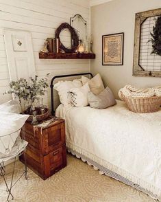 a living room filled with furniture and a chandelier hanging from the ceiling over a rug