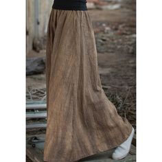 Versatile Elastic Waist Skirt Fabric: 70.8%Ramie+29.2%Cotton Size: Free Size Multiple Color Selections: Brown, Apricot Skirt Type: Skirt Style Type: Street Trendy  Season: Spring, Fall, Winter, Summer Casual Brown Maxi Skirt For Fall, Fall Wide Leg Lined Skirt Bottoms, Fall Wide Leg Lined Bottoms, Baggy Cotton Bohemian Skirt, Relaxed Fit Brown Cotton Skirt, High Waist Flowy Brown Skirt, Bohemian Baggy Cotton Skirt, Fall Long Pleated Skirt, Bohemian Cotton Maxi Skirt For Fall