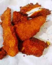 some fried food is sitting on top of a white paper towel and it looks like they have been eaten