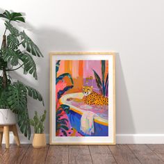 a painting on the wall next to a potted plant and a framed print with a leopard